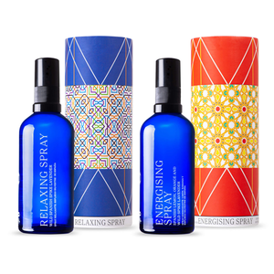 andaluz skincare relaxing spray and energising spray with two blue glass bottles and bright, decorative cases with spanish design inspired from the tiles of the Alhambra Palace in Granada, Spain